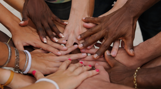 Many hands together Many hands together: group of diverse people joining hands